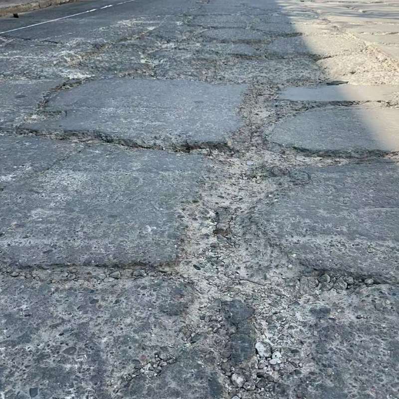 新泰路面起砂露石子修补料